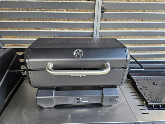 #263 Ex-Diplay (sold as seen) Portable Charcoal Grill Masterbuilt