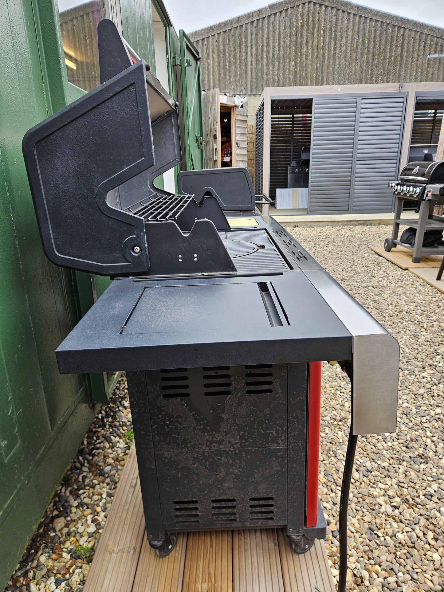 #240 Ex-Display (sold as seen) Outback Red Jupiter 4 Burner Hybrid BBQ With Cover